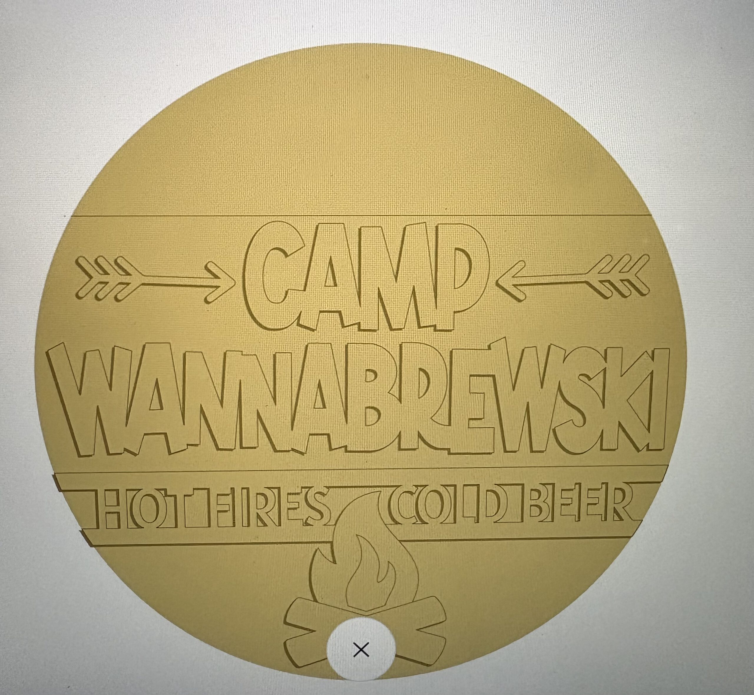 Camp Wannabrewski - Canvas, Corks & Forks Yellow circular badge with the word CAMP in large outlined letters and decorative arrows on both sides; a small white circle with an X overlaps the bottom edge.